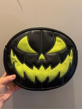 Love Pain and Stitches green and black purse